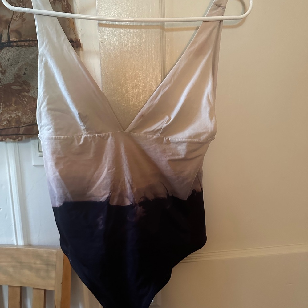 One piece swimming suit. Used only twice. Great shape! Size M